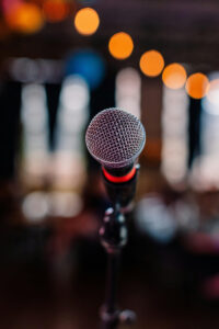 Photo of a microphone - Photo by Kelly on Pexels - https://static.wixstatic.com/media/e35a5d_6c1dda70b85a4e40bbdbd68b8941edda~mv2.jpg/v1/fit/w_700,h_2000,al_c,q_85/e35a5d_6c1dda70b85a4e40bbdbd68b8941edda~mv2.jpg